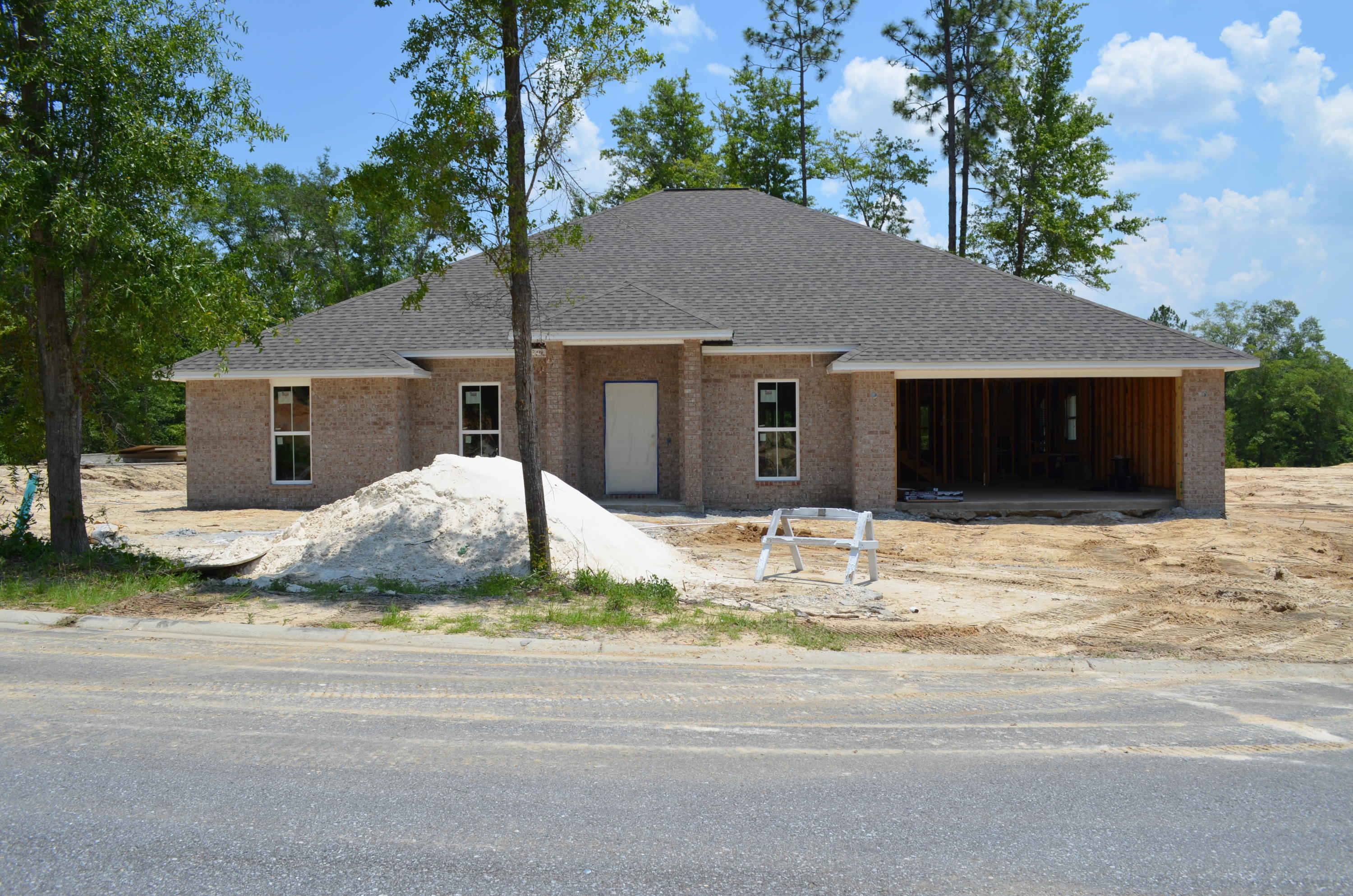 This 3007 square foot FIVE BEDROOM, THREE BATH house (with MANCAVE upstairs) is located in the new neighborhood of Kaitlyn's Preserve in the southernmost end of Crestview. This THIRD ACRE lot will be sodded, landscaped and have a programmable SPRINKLER SYSTEM. Durable porcelain tile will be found in all the wet areas with carpeting in the bedrooms and living room. The master suite will have a tray ceiling with triple crown molding and ambiance lighting as well as a private patio. The kitchen will come supplied with stainless steel appliances to include dishwasher, microwave, and smooth top stove/oven. A huge walk-in pantry will provide plenty of storage space. Tucked in the back corner of the house, guests will feel PRIVATE with their own bedroom and bathroom. Builder offers to pay. . .
