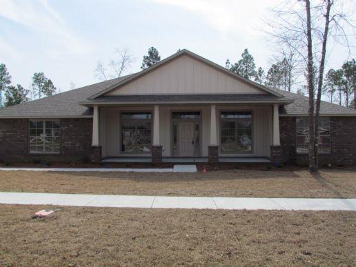 **BRAND NEW 3054sf HOME with huge COVERED FRONT PORCH and 14'X 24' COVERED BACK PORCH! on a 3/4 ACRE LOT ! Great location in Pace ! New quality home by an award-winning Semi-Custom homebuilder, celebrating 20 years in business. NEW DESIGN LOADED WITH AMENITIES! This popular design includes the following: * 3054 square feet of living space * Craftsman style brick exterior * Covered Front Porch * Sprinkler System * 30-year dimensional shingles * 5/8'' Sheetrock in all ceilings * Energy Efficient Heat Pump * Arched windows * 3-CAR SIDE ENTRY GARAGE with Steel Garage Door and Garage Door Openers * 4 Bedrooms / 3 Full Baths * High Ceiling * Split Bedroom Design
