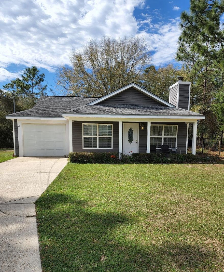 Looking for a great buy in this market this 3BR, 2BA like new home sits on a large lot at the end of a cul de sac on almost 1/2 acre!  Built for low maintenance this home has it all with vinyl siding, tile flooring, and granite countertops and also includes brand-new stainless appliances! The open living room features a gas/wood burning fireplace, like new tile flooring, the kitchen has plenty of cabinets and breakfast bars. This home achieves the most out of its economical floor space. Home has a fenced in back yard, 1 car garage and one of the larger lots in area ~ paved road frontage! MOVE IN READY