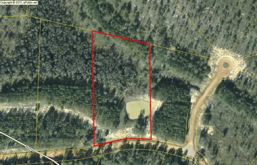 Beautiful 4.52 acres in rural Holmes county with a small pond, located in a gated and platted subdivision with under ground electric and some roads paved.