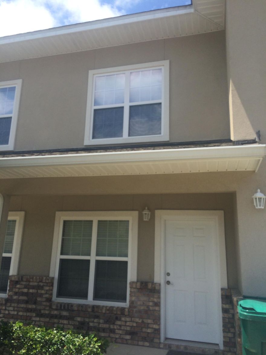 Lovely townhome with granite countertops, stainless appliances tile in wet areas and wood in all other areas.