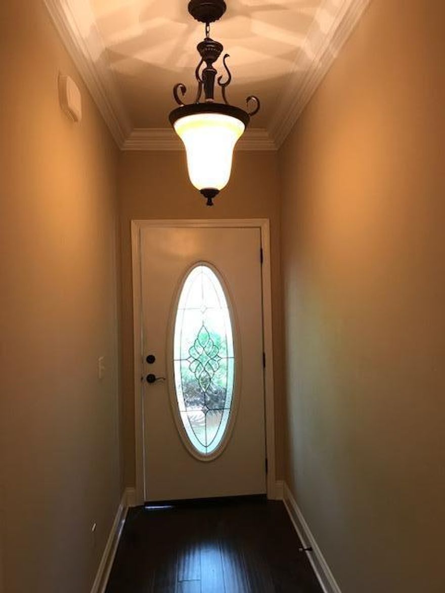 custom built brick home with 4 bedrooms, 3 baths, formal dining area, over sized great room, hardwood flooring in main areas, tiled kitchen & bathrooms, carpeted bedrooms,laundry room, PEX water control system, over sized garage, sprinkler system. mature trees. The custom kitchen has tons of storage, granite counter tops, breakfast bar, stainless appliances, commercial grade refrigerator/freezer. The large master suite has his and her walk in closets, separate shower and bath and dual vanities. There is also a covered porch off the over sized great room. This is a well thought out floor plan, very user friendly. Owner will consider pets with a $250 non refundable pet fee & $250 refundable pet deposit (per pet)All adults living in home will need to fill out application