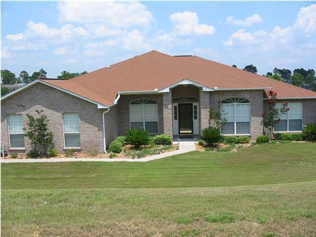 Don't miss this opportunity for an all brick home South of I10 with over 2,500 sq. ft. of living space with side entry garage on corner lot. The home features a split bedroom floor plan with access to covered lanai from the master bedroom and the family room. Master bedroom has garden tub and separate shower along with double vanities and double closets. Large kitchen with island & breakfast area and there is also a separate formal dining room. Just off the entrance is the living room or can be used as a study. French doors open to the rear covered lanai with extended patio for entertaining. This is a well maintained home in a great area at an attractive price. Call and schedule your viewing today. Prospective buyers & their Agents should confirm all information to their satisfaction.
