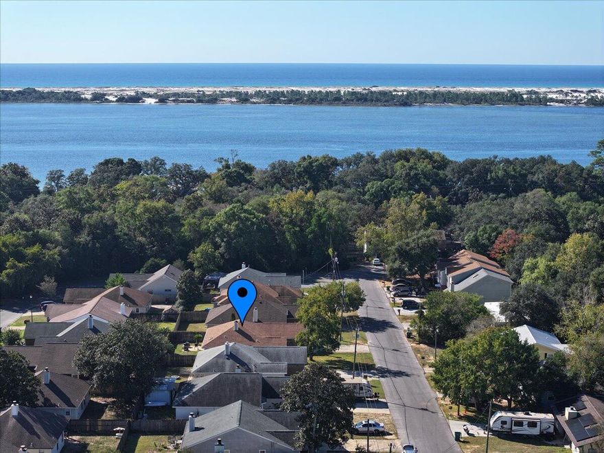 Welcome to this charming 3-bedroom, 2-bath Home offering 1,325 square feet of comfortable living space perfectly situated just 2.5 miles from Hurlburt Field! Whether you're commuting for work or looking for an Investment opportunity, this location can't be beat.Step inside to a bright, functional floor split plan designed for easy living. The fenced backyard provides a private space for relaxing, entertaining on the covered patio while letting pets play. With a 2023 HVAC system and PAID OFF Solar Panels, this Home offers modern efficiency and low utility costs -- a huge plus for Homeowners and Investors alike!  Call for your private tour!