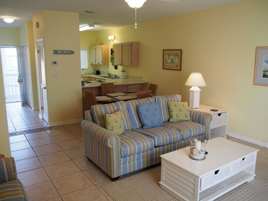 What a deal - the LOWEST PRICED property on the south side of 30A by over $45K! A multi-level 2BR townhome in Sandcastles by the Sea, featuring open LR/DR, Kitchen w/breakfast bar, vanity/sink in the MBR, covered parking, ample storage, and 4 decks (plus a peek of the gulf). Just over 300 yards to the Beach Access with parking/restrooms/lifeguards. Updated furnishings, sleeps 6, AC/Washer/Water Heater have all been recently replaced. Blue Mountain Beach is THE place to be now, popular 14-unit complex w/pool south side of 30A, walk to Blue Mtn Creamery! This well-maintained building has new decks (2014), new siding/roof (2010), and pool fence/landscaping upgrades scheduled. These do not come on the market often, please call today for your private showing appointment.