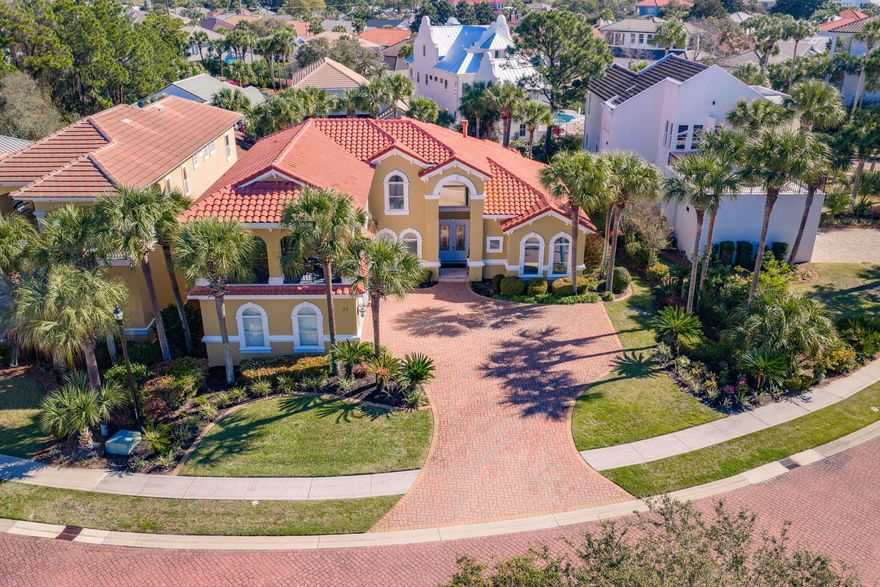 Priced below appraised value! This stunning custom-built Mediterranean beach home is located in the prestigious gated community of Destiny East. From the moment you arrive, beautifully landscaped grounds with lush palm trees and a pristine exterior create a striking first impression. Designed for effortless indoor-outdoor living, the home features expansive glass pocket doors that fully retract to the enclosed lanai--perfect for entertaining or relaxing in style. The spacious kitchen blends elegance and functionality, offering a paneled refrigerator, double ovens, a gas cooktop, and a large center island with sink. The first-floor master suite provides private access to the lanai, a generous walk-in closet with custom built-ins, and a luxurious ensuite bath complete with a spa tub and walk-in shower. Two additional bedrooms are also located on the main level, including one with its own private bathroom.
Upstairs, you'll find two more bedrooms--each with a private bathroom--and access to a spacious balcony, the perfect place to unwind and enjoy breathtaking sunset views.
Additional highlights include a tankless water heater, energy-efficient foam insulation, and a walk-in attic. The expansive driveway offers ample parking, complemented by a three-car garage. The backyard provides plenty of space to add a private pool.
Whether you're seeking a primary residence, second home, or investment opportunity, this property offers exceptional flexibility, with short-term rentals allowed.
Residents of Destiny East enjoy exclusive amenities, including private beach access, a community pool, tennis courts, and a clubhouse.
Don't miss the opportunity to own this exceptional coastal retreat!