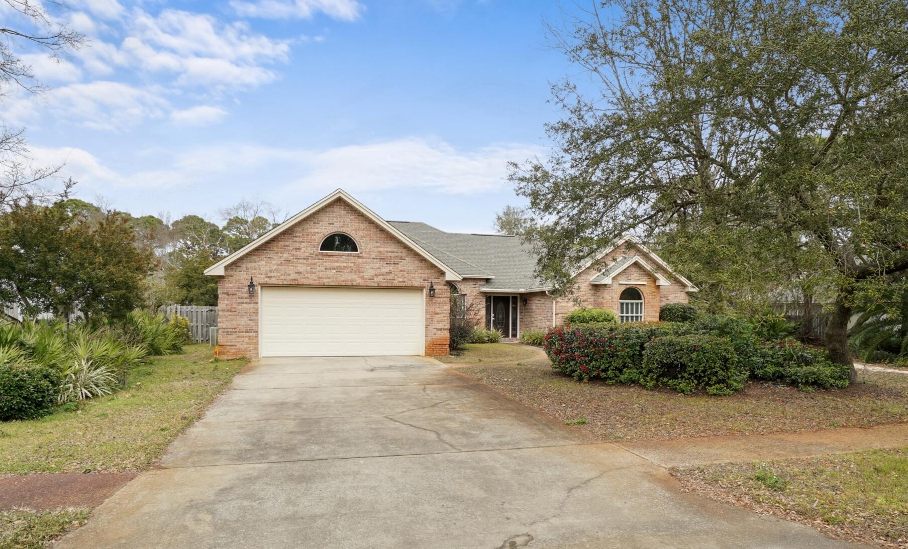 Reward yourself with this 3 Bedroom 2 full Bathroom brick home located in the sought after Windsor Forest neighborhood. This home was previously under contract and fell through due to no fault of the sellers. It has a spacious living room with vaulted ceilings, a gas fireplace and great natural light. The kitchen is sure to bring out your inner chef! In it you'll find granite countertops, stainless steel appliances, a breakfast bar, and plenty of cabinet and counter space. The large master bedroom has vaulted ceilings, two large walk-in closets, and an access to the screened in porch. The master bathroom feels more like a spa with an oversized whirlpool tub, large walk-in shower, granite countertops and double sinks.