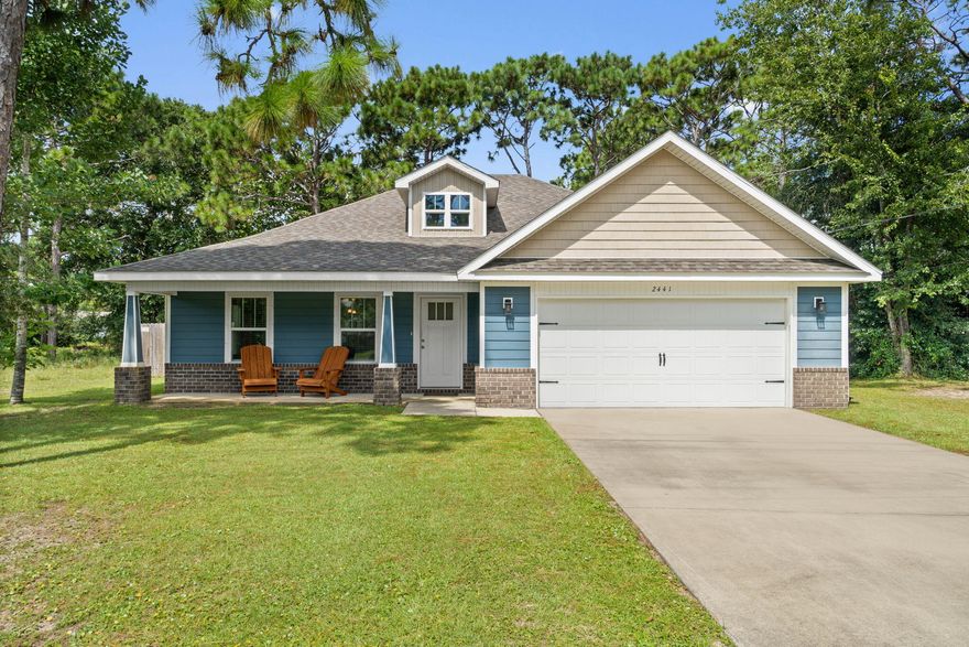 Welcome home to this impeccably maintained 2017 craftsman style home located on almost a half acre lot with producing orange and grapefruit trees in the backyard! Featuring 3 bedrooms plus a private office, this beautiful home has all the updates you've been looking for. Pull into the driveway and immediately appreciate the spacious front porch which leads inside to a fantastic open floor plan with hard surface flooring throughout all the common areas. The large living room showcases numerous windows for lots of natural sunlight and it's open to the eat in dining space and well appointed kitchen. The kitchen features granite counters with a functional island and hope up bar for seating, pendant lighting, and stainless steel appliances including a drop in stove and french door refrigerator.