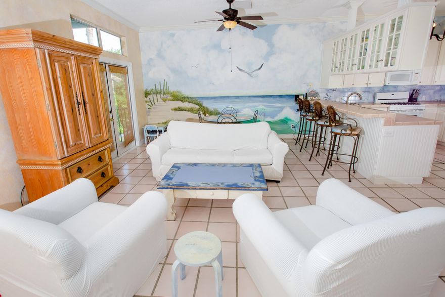 Great Investment Property currently booked at $5,000 per week! Terra Cotta Terrace features luxury Mediterranean style homes, located in the highly sought-after Crystal Beach. This Handpainted Villa is situated only a few steps from the sugar-white sands of the Gulf. The first floor has an efficiency apartment with a lock-off entrance. The garage has been converted into a kid-friendly bunk room. The second story has a well-equipped kitchen and a cozy and comfortable living area. The second story bedroom features a private balcony. The third story has an expansive master bedroom suite with a marble gas fireplace, large master bathroom, and balcony. There is a second master bedroom with two balconies.