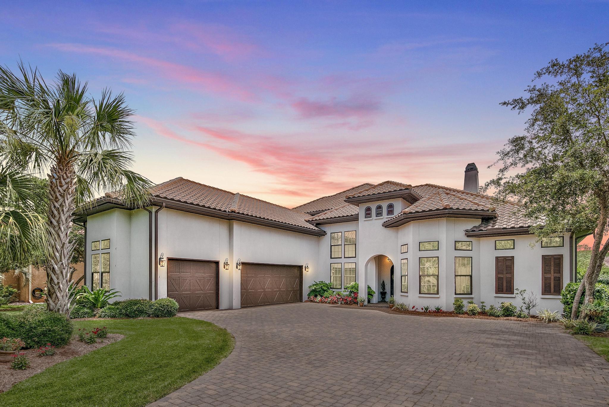 This beautiful home was custom built as the primary residence of a well established local builder. A builders personal home is always custom fit with the finest materials and plenty of upgrades.This spectacular floor plan includes; a car lift in the garage, large outdoor living space, covered pool, jacuzzi, summer kitchen and spectacular view.Don't miss this opportunity to own a unique lakefront treasure in the heart of Regatta Bay. Featuring 3 bedrooms plus office on main level and 2 bedrooms plus workout room and bonus room upstairs. This house has plenty of room to spread out and entertain.Built with Jeldwen wind and impact rated doors and windows, whole house generator, whole house SONOS surround sound system, wired for alarm and cameras, summer kitchen (click More)