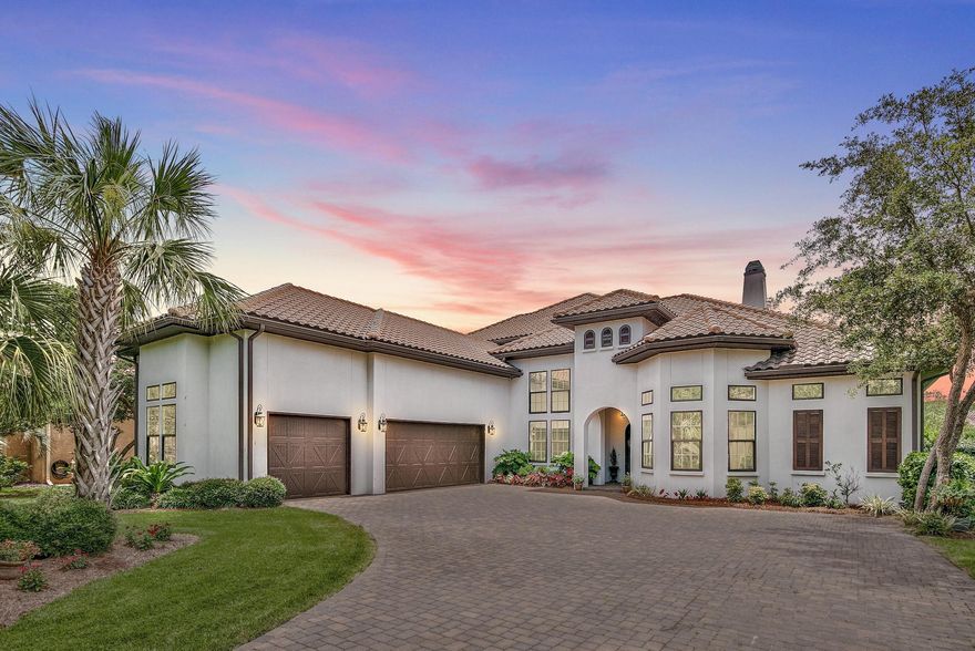 This beautiful home was custom built as the primary residence of a well established local builder. A builders personal home is always custom fit with the finest materials and plenty of upgrades.This spectacular floor plan includes; a car lift in the garage, large outdoor living space, covered pool, jacuzzi, summer kitchen and spectacular view.Don't miss this opportunity to own a unique lakefront treasure in the heart of Regatta Bay. Featuring 3 bedrooms plus office on main level and 2 bedrooms plus workout room and bonus room upstairs. This house has plenty of room to spread out and entertain.Built with Jeldwen wind and impact rated doors and windows, whole house generator, whole house SONOS surround sound system, wired for alarm and cameras, summer kitchen (click More)