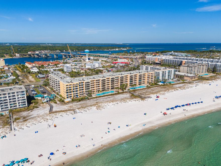 Welcome to Azure Condominium, the crown jewel of Okaloosa Island -- where Mediterranean elegance meets the breathtaking beauty of the Emerald Coast. &#127754;&#9728;&#65039; Perched on the top floor, Unit 605 offers a rare, unobstructed 180 panoramic view of the shimmering Gulf of Mexico and its world-famous sugar-white sands. &#127958;&#65039;&#10024; Designed for those who appreciate the finer things, this stunning 3-bedroom, 3-bath residence captures coastal luxury at every turn. The master suite opens directly to the Gulf, featuring floor-to-ceiling glass doors, a spa-inspired ensuite with double vanities, granite countertops, and a two-person whirlpool tub -- perfect for sunset relaxation. &#128705;&#127749; The chef's kitchen impresses with 3cm granite surfaces, a breakfast bar, and stainless-steel appliances, making it ideal for entertaining in style. <w<} Enjoy 9-foot ceilings that enhance the airy, open feel, and step onto your private balcony to watch dolphins play or the sun melt into the horizon. =,<4 Azure's exclusive amenities include two resort-style pools (one heated), two hot tubs, and gated, covered parking  all within a secure, beautifully landscaped setting with Mediterranean architecture and soothing water features. =<: Top-floor residences at Azure are highly sought after and rarely available. With excellent rental income potential, this is both a luxurious getaway and a smart investment.