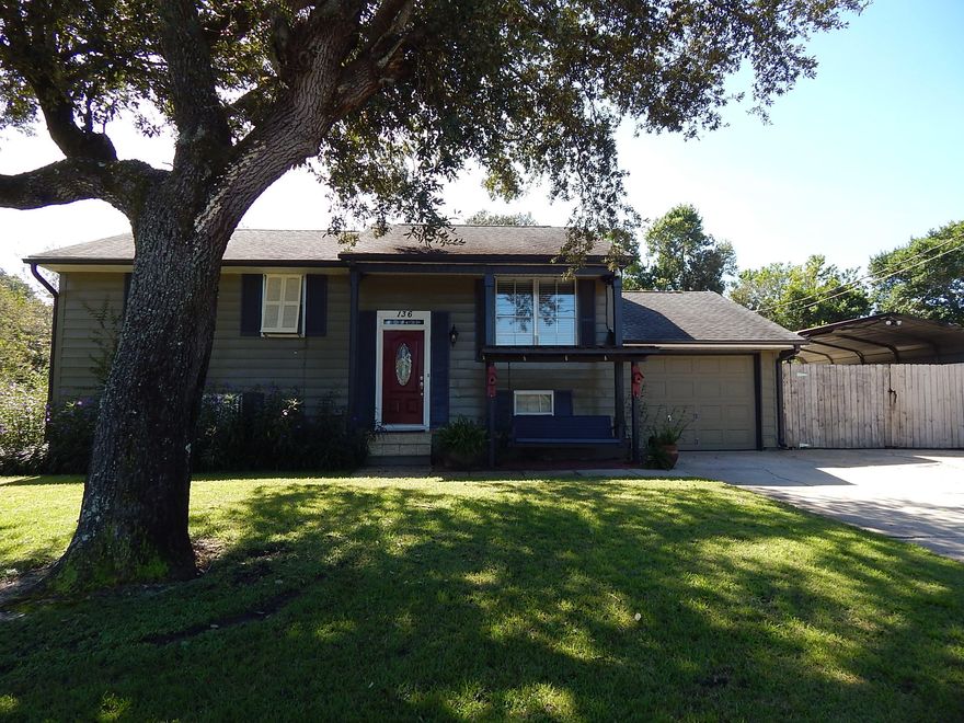 Move In Ready! NO CARPET! Quarter Acre Lot! Walk to Vesta Heights Park with playground & 1-Mile walking path at end of the street! Fenced Back Yard is like an Oasis: Covered Porch, Coy Pond & Large Workshop! This charming older home has all the modern updates! Floor plan is unique and flexible! Potentially TWO Masters! 1st/upper level has Foyer, Living room, Kitchen, Dining room, two bedrooms and a Full bath in hallway with an Updated Tiled Shower. Downstairs there is a huge family room, two bedrooms, a full bath and bonus room with Laundry. Next to laundry, a door goes through a utility closet up a few steps & outside. The upper floor has a spacious Kitchen with tile backsplash, nice appliances, Large breakfast bar, dining rm and a back door that opens to the Covered porch,