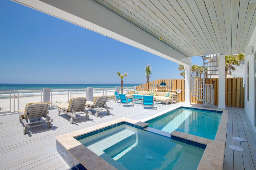 Boasting a magnificent gulf-front position, this newly completed custom beach house is the ultimate vacation home, either for living in or generating an impressive passive income. Laid out on four levels with breathtaking views, this spacious home offers over 5,198square feet of gulf-front living for up to 30 guests on a group vacation, family reunion, beach wedding or corporate retreat. Nine bedrooms along with a fun bunk room along with 10.5 bathrooms provide private amenities while two restaurant-worthy kitchens have everything you need for snacks, meals and drinks. Gather round the oversize table for meals, card games and late-night conversations and make plans for the day ahead.