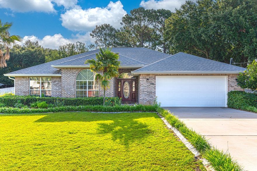 Welcome to this beautiful well-maintained home in West Navarre! Upon entering, you will find a formal dining area that would also work well as an office or playroom. The cozy living room features wood floors, a fireplace, and a view of the large backyard. As you walk into the kitchen, you will find a large dining area which also has a viewing window looking directly out into the backyard. The contemporary kitchen features white cabinets, a breakfast bar, and stainless appliances, all of which convey. Stove/oven replaced Nov, 2021. Refrigerator replaced in approximately 2018. The dishwasher was replaced in 2017. The master bathroom has a separate shower and garden tub as well as a spacious closet with wire shelving. Septic tank was last pumped and inspected February, 2023. Gutters replaced in approximately 2018-2019 and leaf filters installed about a year later. Air ducts cleaned 2022. Insulation in attic replaced 2022. Roof replaced in 2017. Enjoy all of the amenities Holley by the Sea has to offer including an indoor and outdoor pool, playground, tennis courts, baseball fields, and so much more! With the beach just up the road, this turnkey home is ready for new owners!