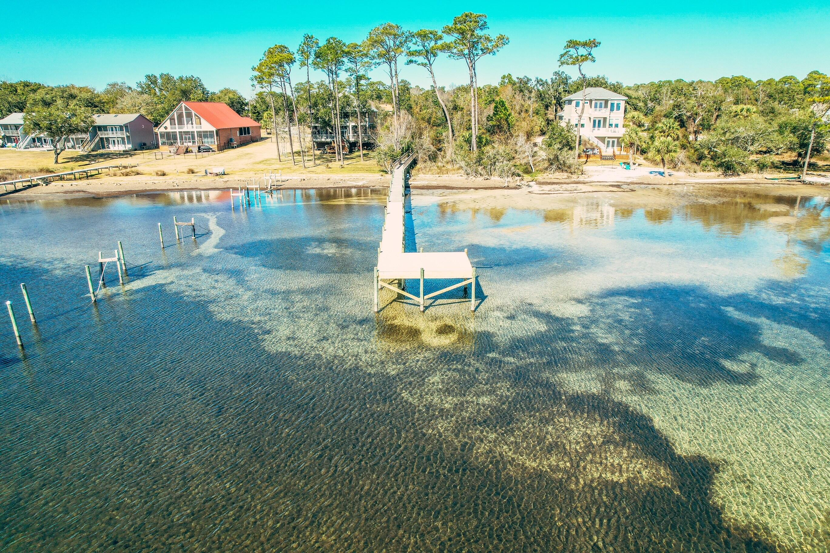 Build your new home in Magnolia Harbor! This lot is nestled in a cul de sac, located within a waterfront community with deeded access to the sound. Fish off of the community dock, take a swim, or go kayaking/paddleboarding in the Santa Rosa Sound. The seller is even willing to clear the lot with an acceptable offer to give you a jump start on your dream home!Buyer to verify all info deemed important.
