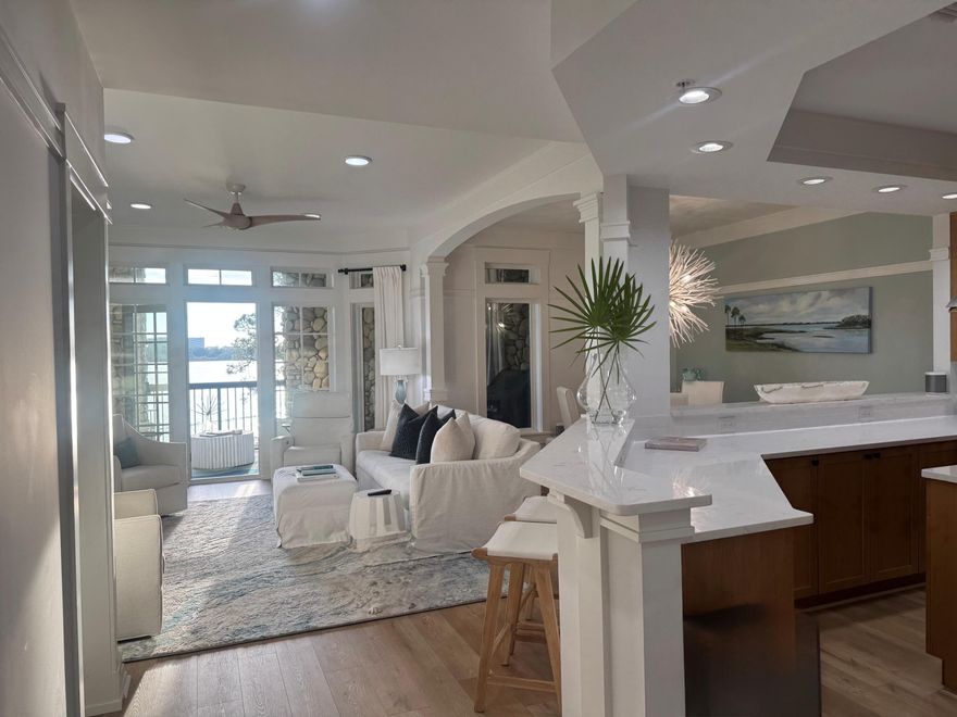 Completely updated and truly move-in ready, this stunning 3-bedroom, 3-bath waterfront condo in Wild Heron offers unobstructed center views of Lake Powell and pool--paired with exceptional indoor and outdoor living. Enjoy front-row sunsets from your spacious second-story balcony. The updated, open-concept kitchen is designed for both function and style, featuring a gas cooktop, stainless steel appliances, quartz, countertops, and a generous walk-in pantry--ideal for everyday living or entertaining.The waterfront primary suite is a private retreat with balcony access, a large walk-in closet, dual vanities, a soaking tub, and a beautifully tiled walk-in shower. Each bedroom is en suite. Home has many upgrades and updates see list. An extensive list of recent enhancements elevates every aspect of this home, creating a seamless, move-in-ready living experience. Thoughtfully updated with high-end finishes and designer touches throughout, the residence features a new HVAC system for optimal comfort and efficiency, a built-in ZLINE refrigerator and new 24" stainless steel dishwasher, and elegant quartz countertops in the kitchen. Fresh designer paint and premium Masland wall-to-wall carpeting add warmth and sophistication, while fully renovated, spa-inspired bathrooms--including a Frameless By Design glass shower enclosure--bring a sense of everyday luxury. Updated lighting throughout, including a designer dining room fixture and all new ceiling fans, complements the home's cohesive aesthetic, while custom window treatments and updated living room window glass enhance natural light and views. A Nest thermostat provides modern, energy-efficient climate control, completing a home designed for both comfort and ease.

Located within Wild Heron, residents enjoy gated entry and access to exceptional amenities including a lakeside boathouse on Lake Powell, a resort-style pool, and scenic nature trails--all included in HOA dues. Close proximity to Sharks Tooth Golf Club part of Watersound Club and tennis facilities are available through Watersound Club membership.

This is waterfront living at its finest--refined, relaxed, and ready to enjoy.


All information is deemed reliable but not guaranteed. Buyer should verify all information, including measurements, dimensions, and any details important to their purchase.