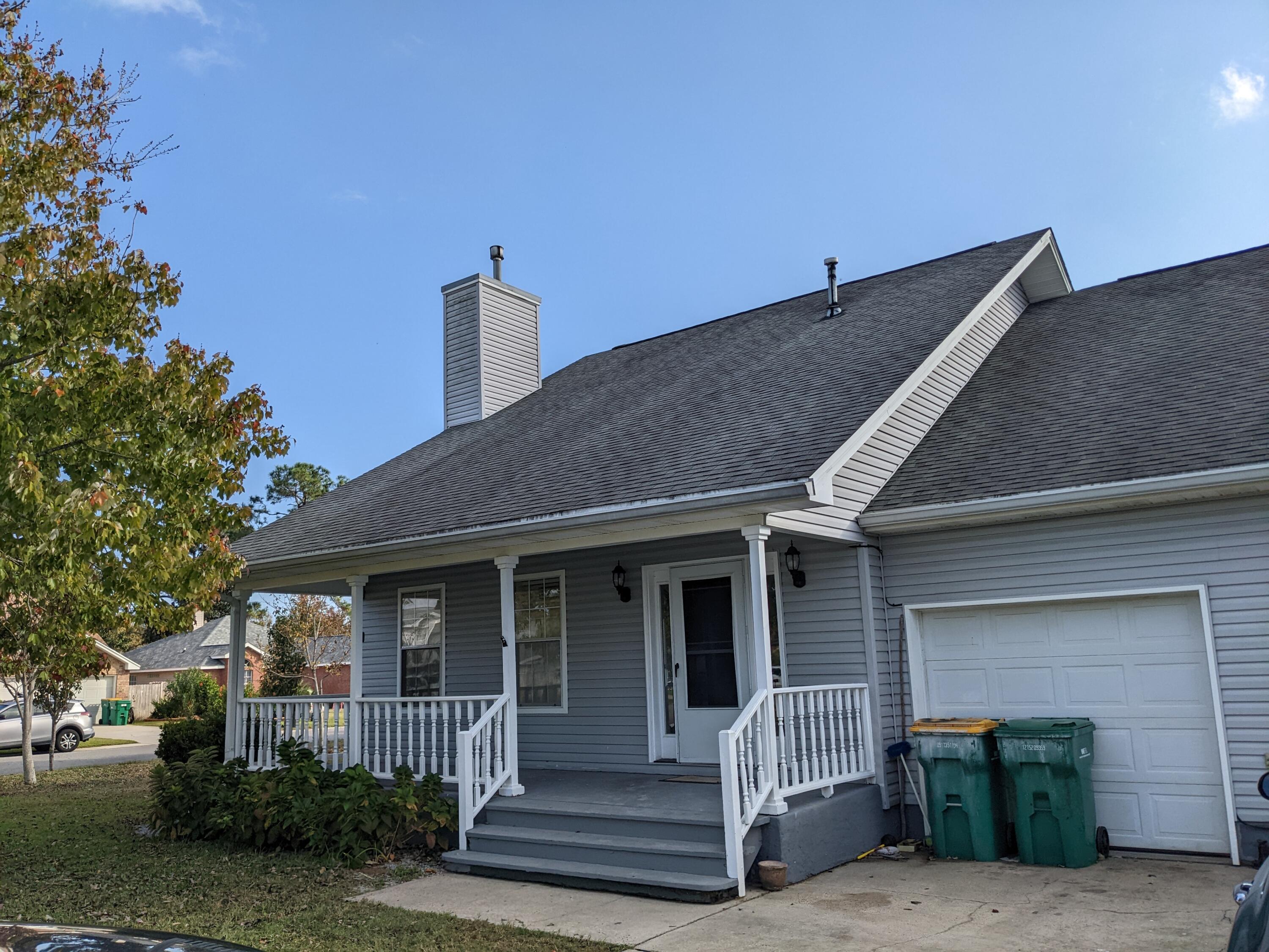 LARGE CORNER LOT WITH PRIVACY FENCED BACK YARD; HARD WOOD FLOORS; COMPUTER ROOM; FIREPLACE.