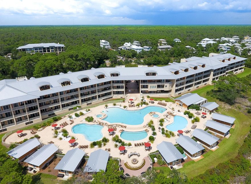 Explore Sanctuary at Redfish, nestled in a landscaped gated retreat South of 30A. This luxury resort is tucked away along Big Redfish Lake and offers abundant nature and serenity, while still within close proximity to all of 30A amenities. This incredible two story penthouse lives more like a home than a condo. Nearly 2,000 SqFt larger than the standard three bedroom in this complex, the extended floor plan of Unit 1111 will provide an exorbitant amount of entertaining space in the open living/dining area and the second level master bedroom or second family room. The first floor features two dining areas, an open living space and a gourmet kitchen featuring stainless steel appliances, a breakfast bar, granite and beautiful backsplash. Spacious rooms are accentuated by 10' ceilings, with 3