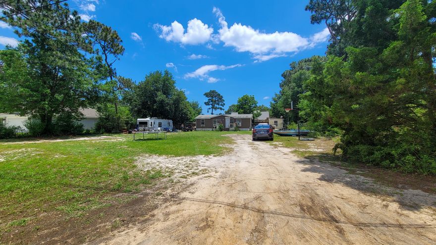Spacious .46 acre lot! Mobile home currently sits on property and holds no value. Financing not available. Looking for investors / builders!