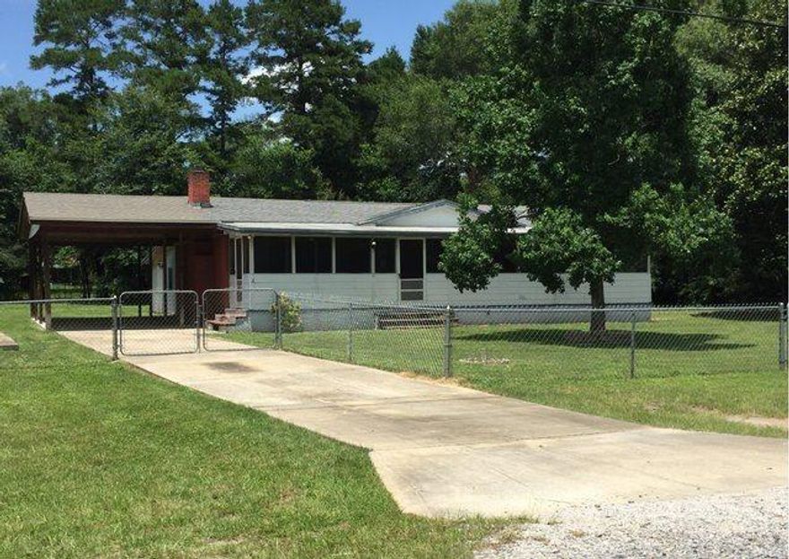 REO ~ All brick 3 Bd / 1 Ba home in a mature community. The home offers lots of potential with hardwood floors, tile in the kitchen & attached carport. All situated on a large lot. This property is eligible under the Freddie Mac First Look Initiative through August 3, 2015.