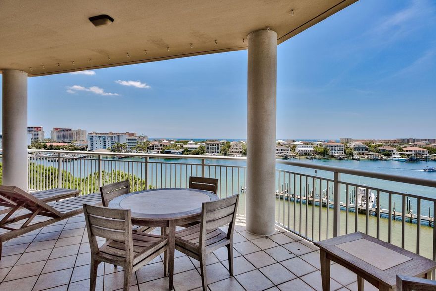 Property is under contract with 72-hour Kick-Out Clause. Amazing sunsets and harbor views abound from this waterfront four-bedroom, four-bathroom condo in the heart of Destin. The ample balcony overlooking the harbor and gulf beyond is an ideal spot for cocktails and family time. The living room has a gas fireplace as well. The balcony includes a built-in gas grill. The open living, dining and family room are great for entertaining or family get togethers. The condo has a full-size washer and dryer. The master suite features two large walk-in closets, a walk in double headed shower, separate garden tub with jacuzzi jets and a double vanity sink. Three other guest rooms have adjoining bathrooms.  An owner's closet outside the front door is the best spot to stash all your beach gear. Rental restricted, Grand Harbor offers amazing amenities including 2.5 acres of land space, a heated, waterfront pool, marina, private boardwalk, conference room, fitness facility, parking garage, gated entry, and a traffic light at its entrance.