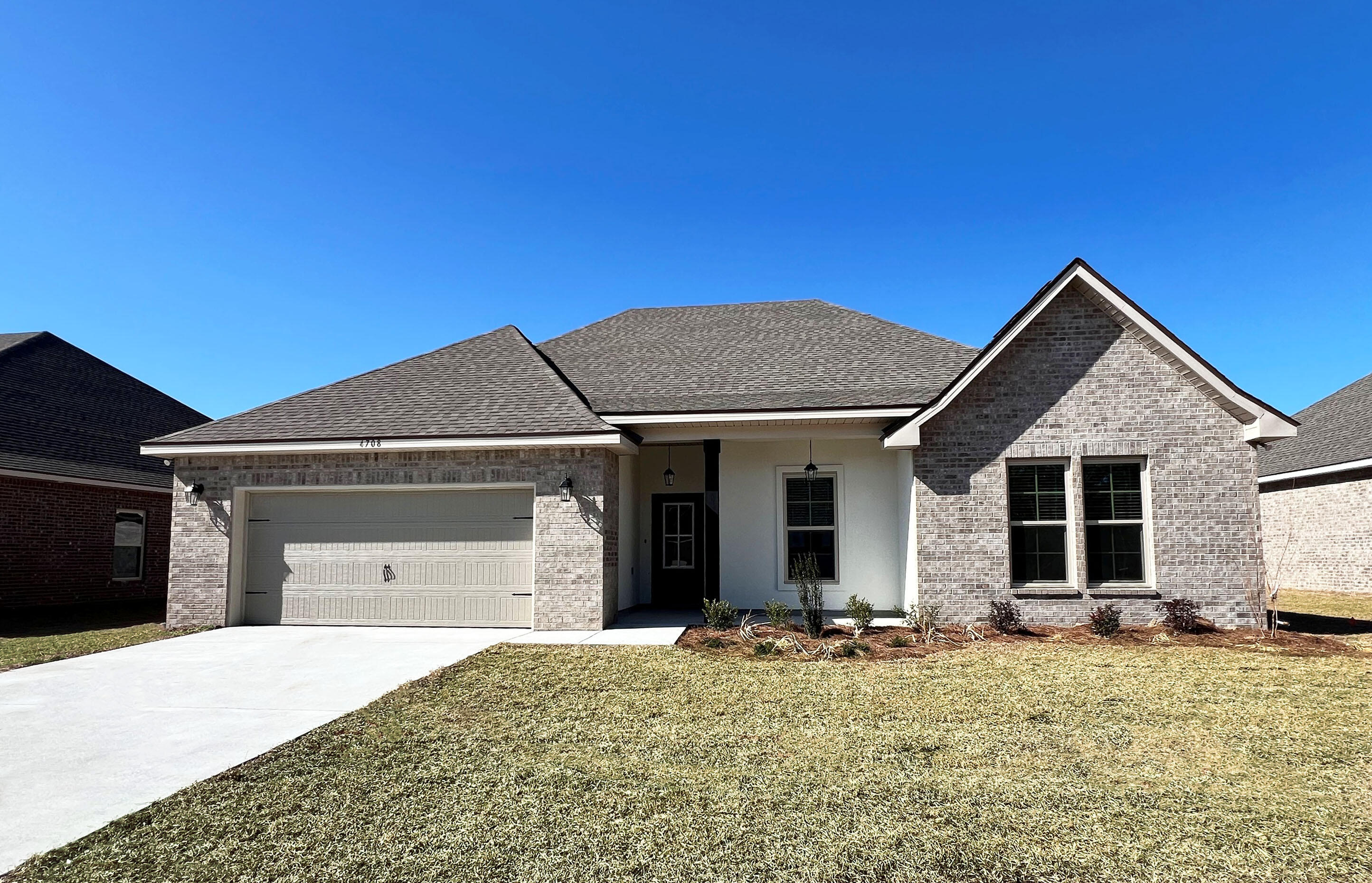 Awesome builder rate plus FREE refrigerator. Restrictions apply.The CAMELLIA V A in Patriot Ridge community offers a 4BR, 2BA, open design. Upgrades added (list attached).Features: double vanity, garden tub, separate shower, and walk-in closet in mater bath, kitchen island, walk-in pantry, boot bench in mudroom, covered porches, recessed lighting, crown molding, ceiling fans in living room and master bedroom, smart connect Wi-Fi thermostat, smoke and carbon monoxide detectors, landscaping, architectural 30-year shingles, flood lights, and more!Energy Efficient Features: electric water heater, a kitchen appliance package with a electric range, vinyl low E MI windows, and more! Energy Star Partner.