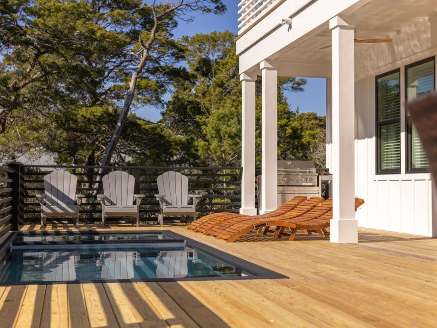 Welcome to The Dune Retreat, an 8-bedroom, 8-bathroom coastal home on an elevated lot on Hillcrest Road, offering Gulf views, private resort-style amenities, and a layout well suited for both personal use and short-term rental income.In 2025, the property generated $244,751 in gross rental revenue, with total guest-paid revenue of $284,173 inclusive of state, county, and tourism taxes. Documentation to follow. For 2026, there is currently $156,730 on the books as of February 8, pacing ahead of the same time last year. Ownership projects 2026 gross rental revenue in the $260,000 to $280,000 range.The home is a short walk to the beach via a pedestrian bridge over Oyster Lake, leading to a low-traffic access point with parking and rinse stations. - Its elevated position offers added privacy and peace of mind while maintaining easy beach access.

The interior features an open-concept layout with high ceilings and a kitchen designed for large groups, including dual full-size refrigerators, quartz countertops, custom cabinetry, and generous dining and gathering space. All eight bedrooms include king beds and private ensuite baths, with two primary suites offering soaking tubs and private balconies. A built-in bunk room adds flexibility for families and larger groups.

Outdoor living includes multiple covered decks, a private pool and spa with a removable divider for efficient heating, a spacious pool deck with seating and fire pit, and a rooftop deck with panoramic Gulf views. A game room, private theater, smart home features, two washer-dryer sets, owner storage, ample parking, a golf cart outlet, and Tesla wall charger complete the property.

Offered fully furnished and rental-ready, The Dune Retreat combines documented rental performance, forward bookings, and a layout proven to support strong demand along 30A.