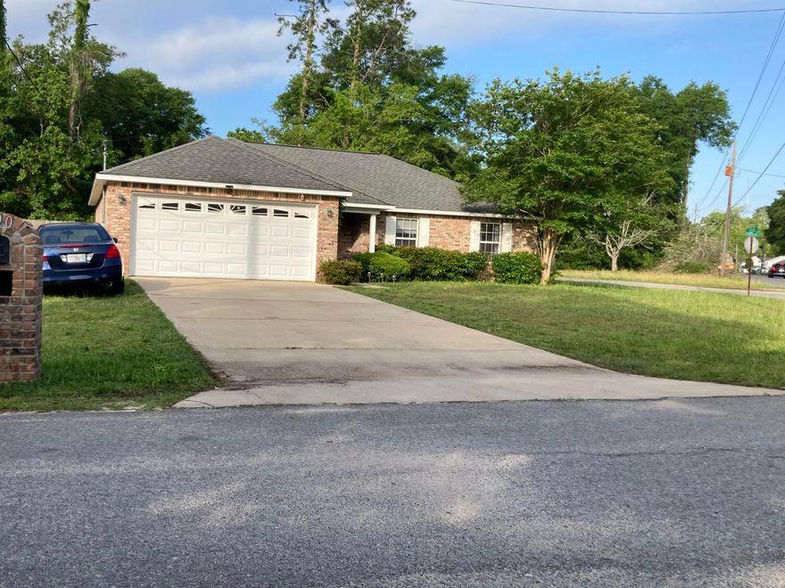 Check out this 3 bedroom all brick home located on a large corner lot in the heart of Crestview. This all electric home features ceramic tile through out the living areas and  carpet in the bedrooms. The kitchen features a Whirlpool smooth top stove and a side by side refrigerator with ice and water in the door. Laundry room is located between the kitchen and the 2 car garage with attic access. The back of the home features a 13X12 covered patio.  New HVAC system was installed in 2018. Buyer to verify square footage.  All offers are to be submitted on a FAR/BAR ''AS IS'' with Right to Inspect Contract.