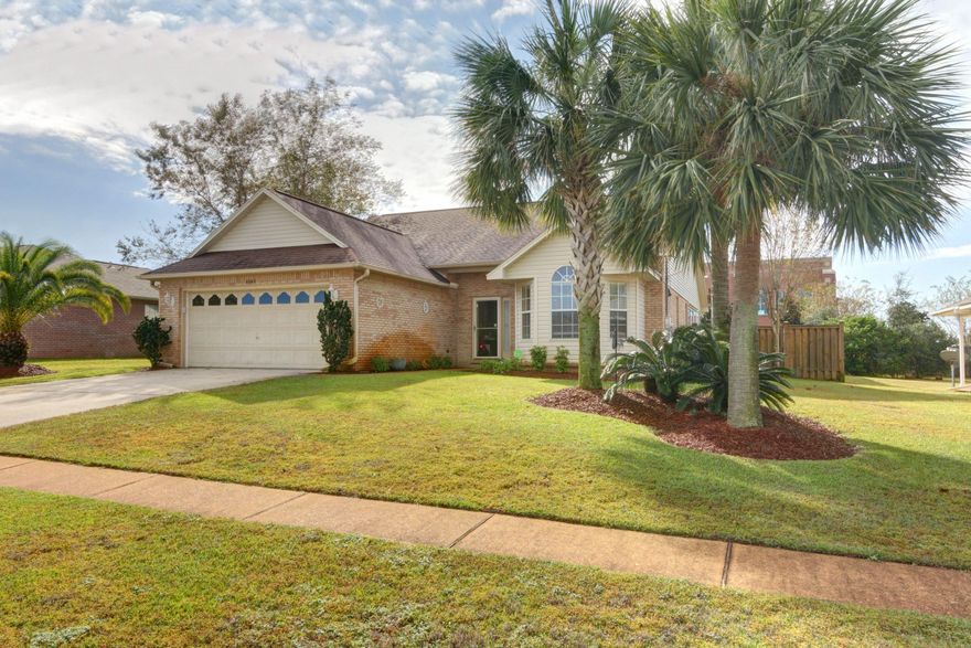 (More pictures coming soon). Adorable all brick home conveniently located in East Navarre, less than 5 minutes to the beach, 15 min to Hurlburt & a short distance to major shopping & entertainment. A large florida room that is heated & cooled offers plenty of additional living space. The master bath features large vanity, cultured marble jacuzzi tub, separate shower & walk in closet. Also features hurricane shutters for Florida Room.