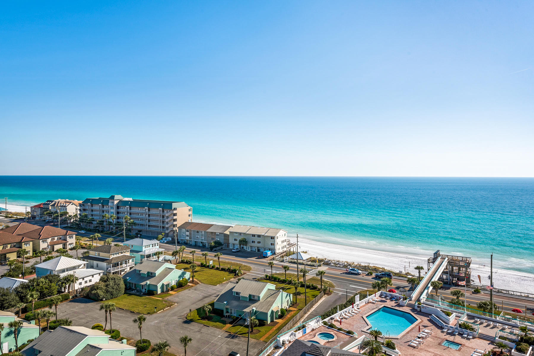 As soon as you step in to this beautiful unit you can feel the stress of every day life just immediately drift away. So much interior space to breathe, tons of balcony space, best of all the views of the white sand and beautiful emerald waters are never ending. Entertaining is a joy as well in the nicely updated kitchen with newer cabinets, granite countertops and stainless appliances. This unit has crown moulding throughout and 20X20 ceramic tile in living areas. It's bathrooms have been updated with ceramic tile shower/bathtub surrounds. As a bonus for investors...you may choose to rent the entire condo as a 3 bed/3 bath, or separate the rentals into the studio space with its' private balcony and the huge 2bedroom/2bath space.