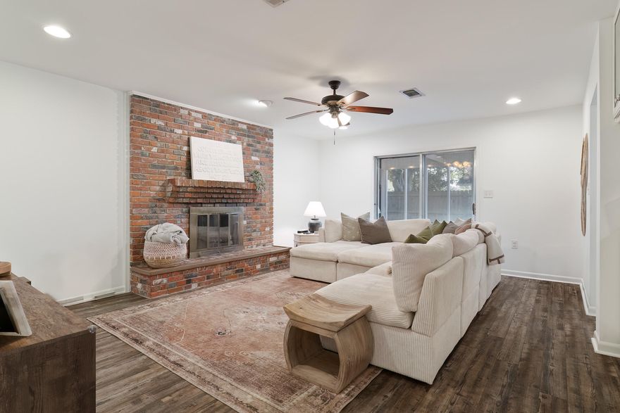 LOAN BALANCE of $232,600 remaining at 4.65% over 30 years. With lender approval, THE SELLER WILL COVER THE  COST TO RECAST the remaining balance, extending the term back to 30 years.  Newly renovated charming ranch-style home features a home brimming with character. This three-bedroom, two-bathroom residence stands out with its unique character and personality, designed to foster memorable family gatherings throughout its inviting living spaces. As soon as you walk through the front door, you'll be mesmerized by its unique charm. The home designed living spaces has been  updated.  The exterior showcases beautiful brick arches and a welcoming pathway leading to the front door. The inviting family room centers around a fireplace, perfect for creating cherished memories. The expansive, fully enclosed back porch is an ideal spot for enjoying morning coffee, reading a book, and watching the local wildlife, birds, and butterflies. It's a picturesque setting straight out of a storybook.   This property is centrally located near military bases, restaurants, and shopping centers. It is situated on a quiet cul-de-sac.  Immerse yourself in your chapter of this storybook.