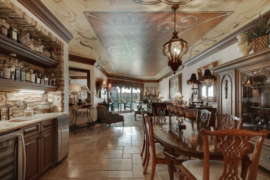 Experience Destin Harbor Living in this beautiful Marbella 3BR/3BA, with media room, Harbor front condominium. The media room may be used as a 4th bedroom. Decorated in a classic Mediterranean design, this unit features beautiful custom finishes including, faux textured walls, ceiling murals and textures, stone, granite, and decorative faux finishes. The unit has solid mahogany doors throughout, granite countertops, and various stone textures. The kitchen hosts large built-in Sub-Zero refrigerator with custom door front paneling, induction cooktop, stove pot filler faucet, mosaic backsplash, faux-brick ceiling, stone vent hood, custom cabinetry, and a unique eat in breakfast bar. Unwind on the spacious balcony and enjoy dazzling sunrises and sunsets over the Destin Harbor. This unit's exquisite upgrades are numerous and a must see. Marbella Condominium sits on a 35 ft. bluff and is in the heart of the Destin lifestyle of boating, golfing, dining, shopping, and the beautiful white sand beaches of Destin. Amenities include fitness room, clubhouse, pool, and access to professional managed 56-slip Marina. All dimensions to be verified by Buyer.