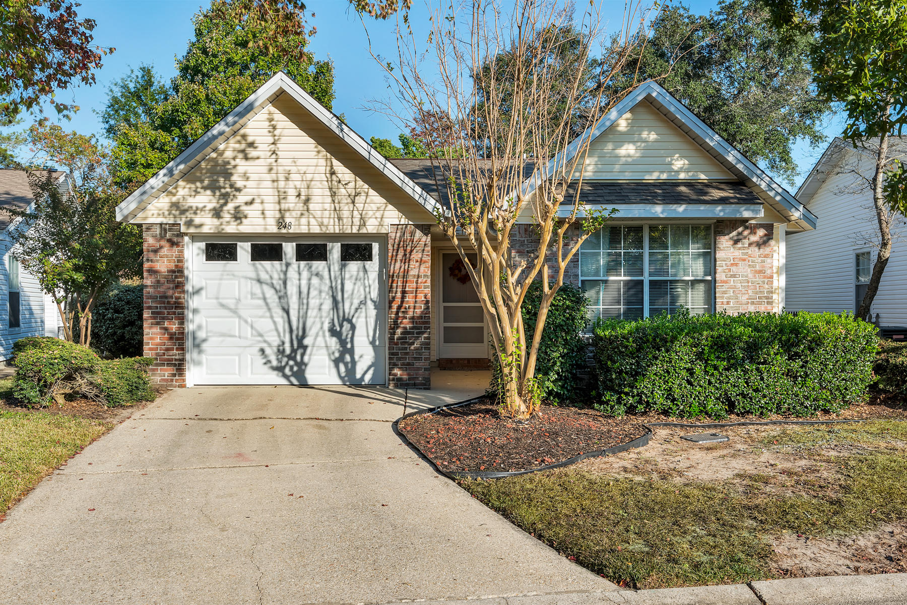 Adorable 3 bedroom home in a highly desirable Bluewater Bay neighborhood. This low maintenance brick and vinyl siding home features a vaulted ceiling and wood burning fireplace in the living room and a spacious screened Florida room off of the dining area. The floorplan offers a split bedroom design as well as an eat-in kitchen and breakfast bar. Washer, dryer and refrigerator included AND a home warranty for piece of mind! Home also has a termite bond. This home is incredibly convenient to everything and walkable to school, restaurants and shopping. It is only minutes away from the EOD school or Eglin AFB. HOA cuts the front lawn, trims the hedges, mulches yearly and maintains the sprinkler system. Perfect home for starting out or downsizing. Call TODAY for your appointment!