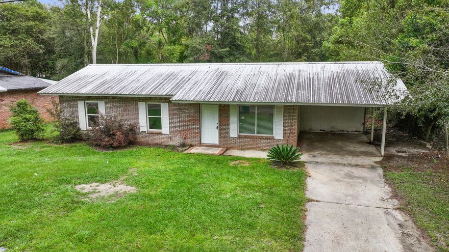 This Brick Home with metal roof has three bedrooms and a full bath. This home is located in Chipley and nestled on a good size lot with mature trees for a relaxing country feel.   The metal roof was replaced in 2017 and the HVAC was replaced in 2018.  Priced exceptionally all this home needs is a little TLC to call this home!  Located near I-10 for easy travel and only an hour drive to the white sandy beaches of the Emerald Coast.  At this price it won't last long so call today for a showing!