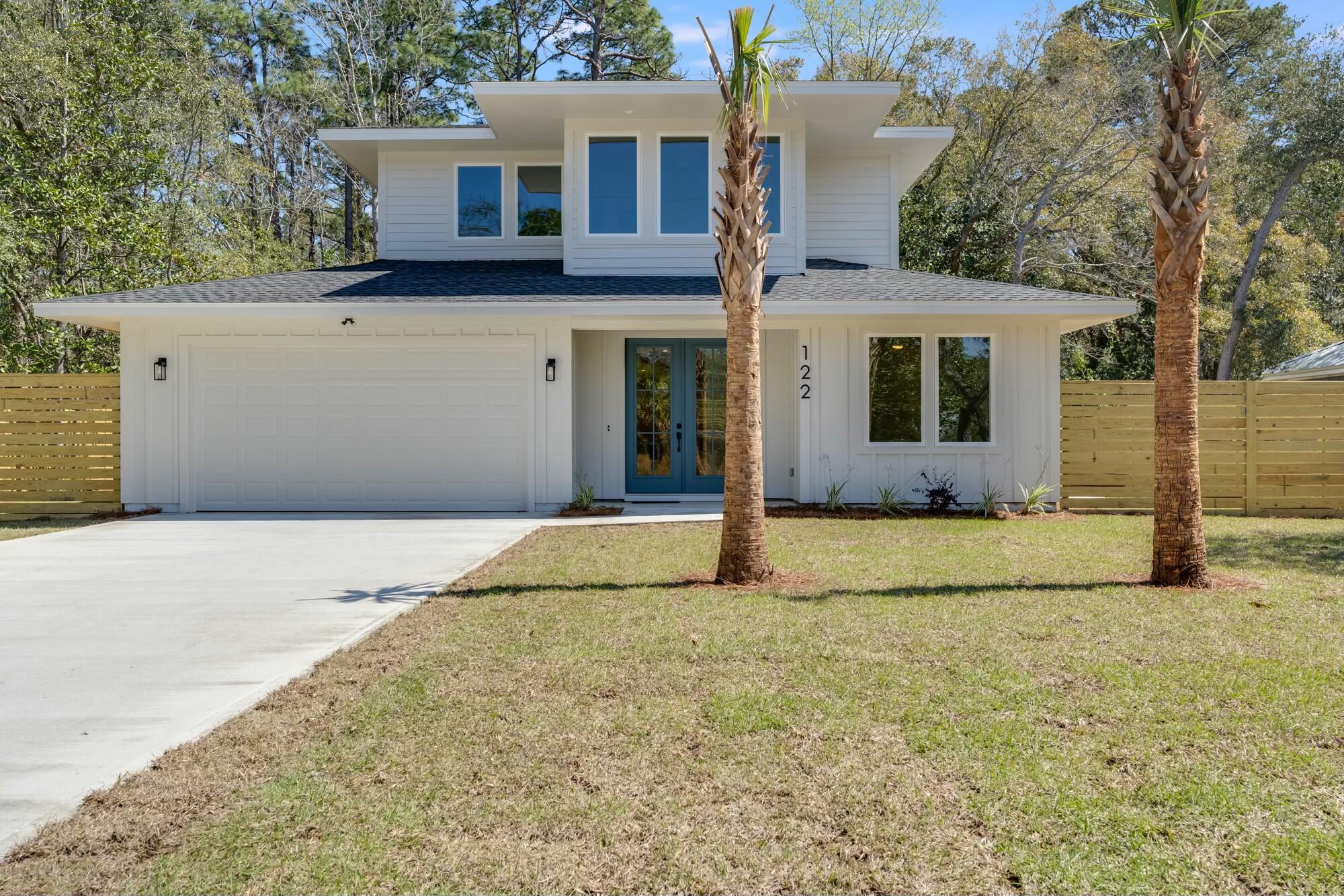 Step into this stunning new construction home in Freeport, Florida, where modern design meets timeless craftsmanship. This two-story, 4-bedroom, 3-bathroom beauty spans 2,200 square feet on a spacious quarter-acre lot.From the moment you walk in, you'll be captivated by the thoughtful details, including elegant trim work and a beautiful shiplap fireplace in the main living area. The kitchen is a chef's dream, featuring gorgeous countertops and a stylish backsplash.The master suite is a true retreat,  boasting a beautiful accent wall, his-and-hers closets, and a spa-like bathroom with a double vanity and dual shower heads. Every bedroom offers custom wood shelving in the closets, providing both charm and functionality. This home was designed with storage in mind, featuring a massive space under the stairs and a generous two-car garage with additional storage. A custom mudroom off the garage entrance adds convenience and organization to your daily routine.

Step outside to find a spacious backyard enclosed by a full privacy fence perfect for entertaining or unwinding. Even the exterior details shine, with beautifully stained porch ceilings adding a warm, inviting touch.

Don't miss the chance to see this incredible home for yourself. schedule your showing today!