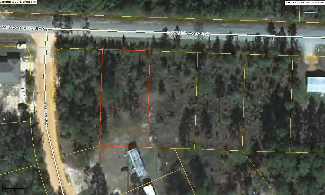 One of 4 consecutive lots on desirable Oakwood Lakes Blvd. These lots are located on a paved road just outside city limits. Tap fee and impact fee have already been paid. Power on road; will require septic tank. Make an offer on one or on all four!