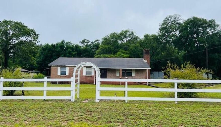 Great investment for a first time home buyer, retiree or for a rental property.  This 3 bdr, 2 bath is in good condition and ready for occupancy.  Conveniently located on a large lot that backs up to Eglin reservation.  Ideal for the buyer who needs plenty of storage.  It has a 3 bay garage building, separate storage shed w/lean to on both sides,  a pole barn for parking vehicles or a boat and a covered fish cleaning area.  A garden area is established w/sprinkler system. Beautiful expansive oaks and hydrangeas highlight the back yard.