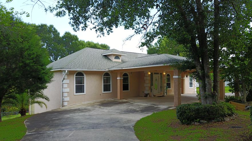 Short Sale -- Opportunity awaits the buyer of this 4000 sqft contemporary stucco home with lakefront lot and enclosed inground pool. The welcoming circular driveway will invite the new owners and guests alike with a large carport at the entrance. Upon entry the large family room features cathedral ceilings, wood floors, and decorative columns, and custom built-in cabintry. The spacious kitchen features a kitchen island, granite countertops, and plenty of cabinetry. The upstairs features 2 spacious master suites with high ceilings, wood flooring, and large master baths with spacious closets. The downstairs is perfect for entertaining with large den/gameroom equipped with a wet bar and breakfast bar overlooking the enclosed inground pool. The downstairs also features a 3rd master