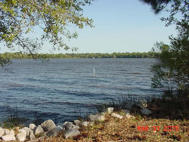 UNCOMPARABLE SUNRISE and SUNSET VIEWS OVER THE BAY. Reduced well below COUNTY ASSESSED VALUE. Capture the charm of Old Florida. Build your dream home and spend time 'sitting on the dock on the bay'. Property has in excess of 220 feet of water frontage. Level and private. Wow, eastern, southern and western waterfront views. Property is on Freeport public water. Septic system will be required.