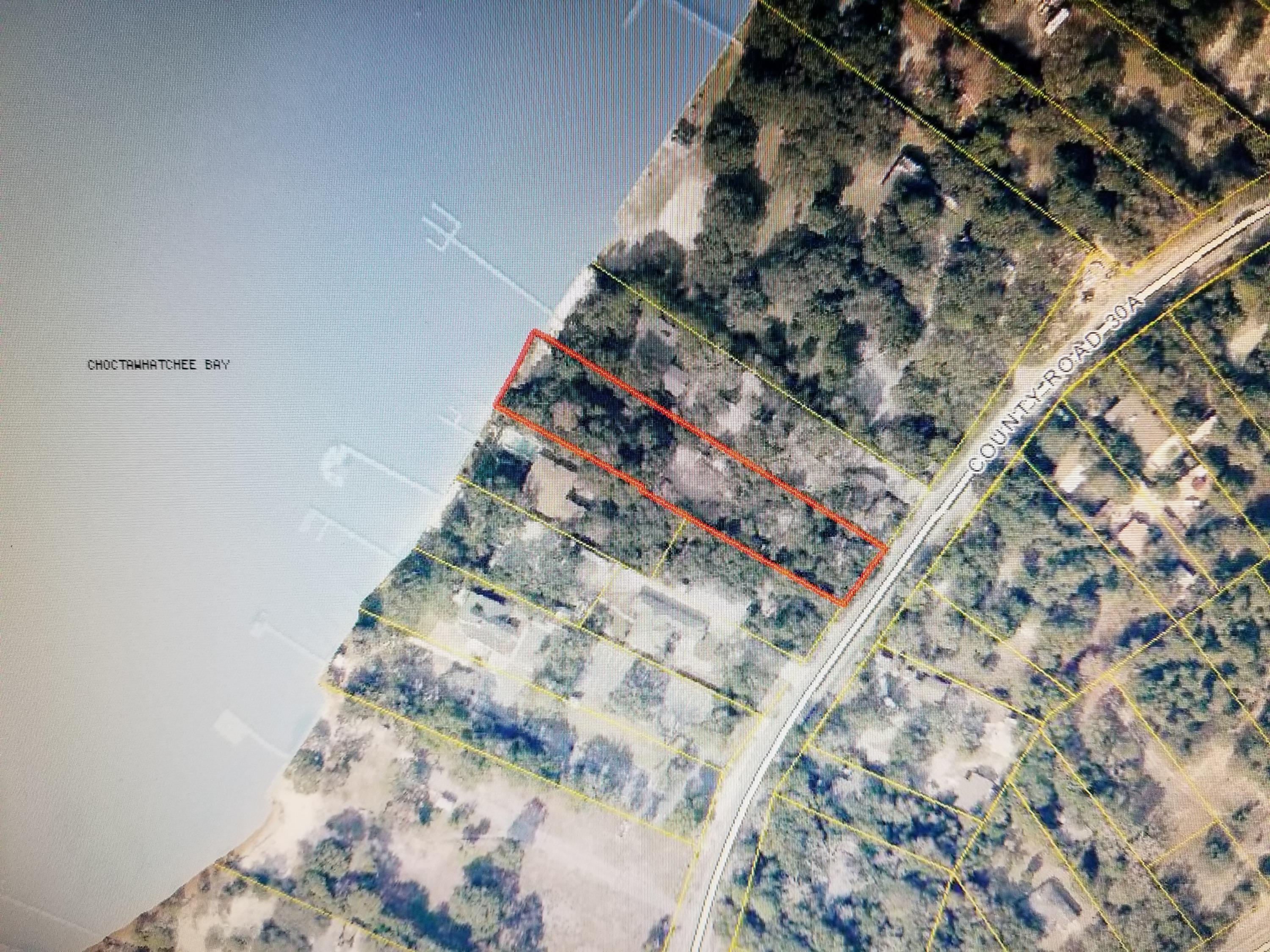 This is a prime waterfront parcel along Choctahatchee Bay with frontage on Destin Pass and views of Crab Island. Zoned Calhoun Mixed Use the property has many potential commercial options. The existing home is very suitable for a work/live water sports business that could substantially cash flow the purchase price. Additional adjacent properties are potentially available to add to development footprint and density.