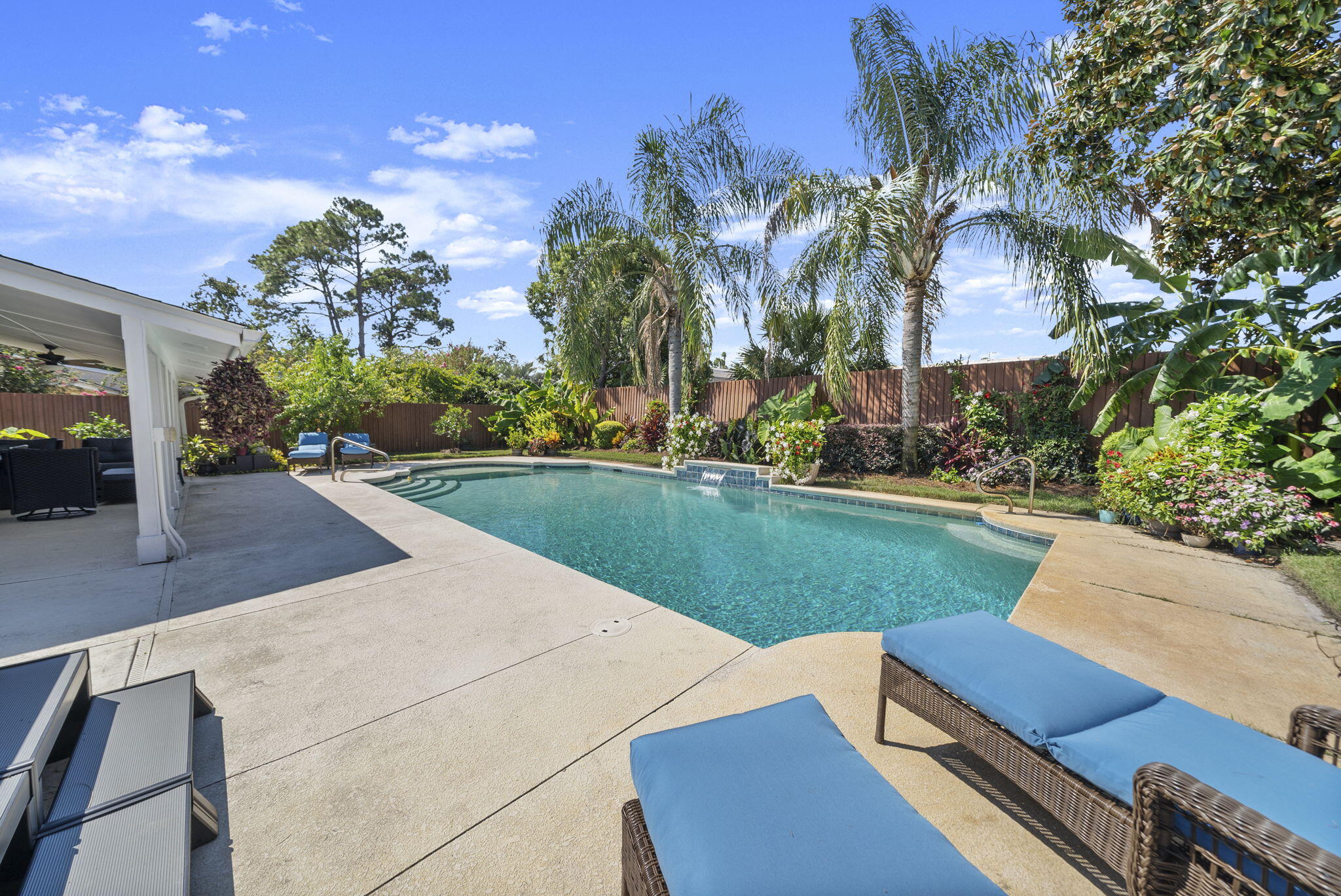 Welcome to 223 Scooter Dr., a meticulously renovated 4BR/2BA retreat where no corners were cut, and no detail was missed. ReFrom the moment you arrive, you'll notice the care and craftsmanship that sets this home apart. The backyard is a true tropical paradise, anchored by an oversized 35,000-gallon heated saltwater pool (7.5 ft deep) surrounded by professional landscaping and pavers designed for entertaining. In early 2025, the master suite underwent a complete reconfiguration and renovation, transforming the outdated layout into a modern design that features a spacious custom walk-in closet, an expanded master bathroom, and the addition of a fourth bedroom. This home is as efficient as it is stunning. With 35 fully paid-off solar panels powering the property, the electric bill averages only $26 per month for the service fee, making this home as smart as it is stylish. Inside, the new primary suite offers a spa-like bathroom with dual 36'' rain showers, while a 4th bedroom addition brings flexibility for family or guests. A custom $10k Closet by Design ensures storage is as beautiful as it is functional. Luxury upgrades include quartz countertops, backsplash, stainless appliances, bamboo flooring, remodeled bathrooms, and a widened driveway with new pavers. Major systems have all been updated: new 3 ton HVAC (2024), (2020) roof, Hardie siding, windows, and tankless water heater. The home also features a whole-house water softener and filtration system with reverse osmosis drinking water, offering the highest level of comfort and convenience. Even the details shine, new pool equipment, 140,000 BTU Electric pool heater, upgraded salt water chlorination pump for pool, custom lighting, and a full fruit orchard with oranges, lemons, peaches, avocados, and more. Every upgrade reflects the seller's meticulous eye, blending comfort, efficiency, and timeless style. This is not just a home, it's a lifestyle.