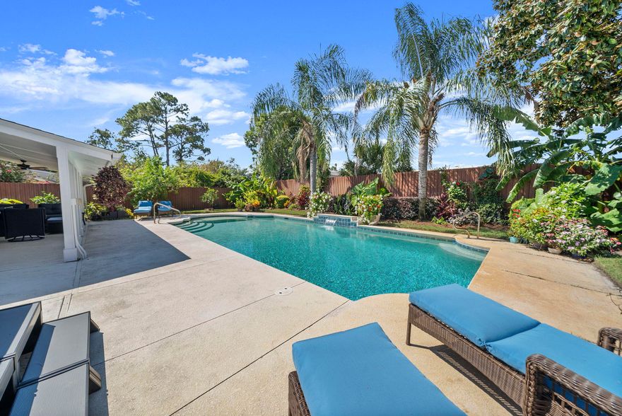 Welcome to 223 Scooter Dr., a meticulously renovated 4BR/2BA retreat where no corners were cut, and no detail was missed. ReFrom the moment you arrive, you'll notice the care and craftsmanship that sets this home apart. The backyard is a true tropical paradise, anchored by an oversized 35,000-gallon heated saltwater pool (7.5 ft deep) surrounded by professional landscaping and pavers designed for entertaining. In early 2025, the master suite underwent a complete reconfiguration and renovation, transforming the outdated layout into a modern design that features a spacious custom walk-in closet, an expanded master bathroom, and the addition of a fourth bedroom. This home is as efficient as it is stunning.  With 35 fully paid-off solar panels powering the property, the electric bill averages only $26 per month for the service fee, making this home as smart as it is stylish. Inside, the new primary suite offers a spa-like bathroom with dual 36'' rain showers, while a 4th bedroom addition brings flexibility for family or guests. A custom $10k Closet by Design ensures storage is as beautiful as it is functional. Luxury upgrades include quartz countertops, backsplash, stainless appliances, bamboo flooring, remodeled bathrooms, and a widened driveway with new pavers. Major systems have all been updated: new 3 ton HVAC (2024), (2020) roof, Hardie siding, windows, and tankless water heater. The home also features a whole-house water softener and filtration system with reverse osmosis drinking water, offering the highest level of comfort and convenience. Even the details shine, new pool equipment, 140,000 BTU Electric pool heater, upgraded salt water chlorination pump for pool, custom lighting, and a full fruit orchard with oranges, lemons, peaches, avocados, and more. Every upgrade reflects the seller's meticulous eye, blending comfort, efficiency, and timeless style. This is not just a home, it's a lifestyle.