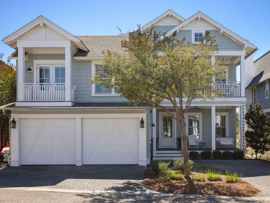 Live every day like you're on vacation in this stunning 5-bedroom, 7-bathroom beach cottage with a private carriage house and two-car garage, nestled in the sought-after Watersound Bridges community. Thoughtfully designed with timeless coastal charm and high-end finishes, this residence offers spacious indoor and outdoor living areas, perfect for relaxation and entertaining. The gourmet kitchen is a chef's dream, featuring Thermador appliances, gleaming Carrera marble countertops, custom cabinetry, a built-in wine fridge, and an ice maker. A hidden walk-in pantry offers additional storage, while the oversized marble-topped island provides ample space for meal prep and casual dining. The open-concept design flows seamlessly into the inviting living room, where exposed wood beams, a stone fireplace with a reclaimed wood mantel, and built-in shelving create a warm yet sophisticated atmosphere.

Designed for seamless indoor-outdoor living, this home features multiple porches at the front and back, ideal for enjoying morning coffee or evening sunsets. A screened-in porch with an outdoor kitchen, built-in grill, and cozy sitting area extends the entertaining space, while the private splash pool with a tranquil waterfall feature offers the ultimate place to unwind. After a day on the beach, rinse off in the convenient outdoor shower before retreating inside.

The primary suite is a luxurious haven, complete with vaulted ceilings, a private balcony, and a spa-like en suite bath. The master bathroom showcases Carrera marble floors, a freestanding soaking tub, dual vanities, and a glass-enclosed walk-in shower with intricate tile detailing. Each of the five bedrooms is beautifully appointed, with en suite baths, ample natural light, and refined coastal design elements.

The private carriage house offers independent guest accommodations, featuring a full kitchen, living area, bedroom, and private balcony, making it perfect for visiting guests, extended family, or rental opportunities.

This home is equipped with a whole-home GENERAC generator, ensuring reliability year-round. Located just minutes from the pristine white-sand beaches of 30A, where days can be spent surfing, sunbathing, or enjoying twilight bonfires, this home captures the essence of luxury coastal living.

Whether you're seeking a primary residence, vacation home, or investment property, this Watersound Bridges retreat is an extraordinary opportunity to own a piece of 30A paradise. Schedule your private tour today!