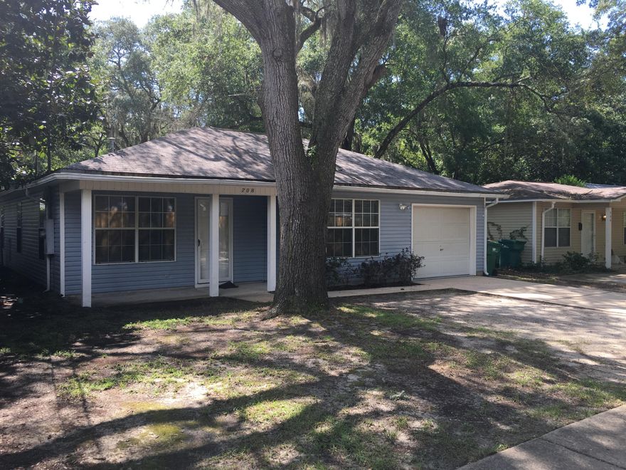 Three bedroom two bath with tile floors throughout. Carpet in bedrooms. Master bedroom with walk-in closet, bath with dual vanities and garden tub. Kitchen with gas stove and pass over window with breakfast bar. Light and bright living room. Fenced back yard. One car garage. Washer and dryer hookup. No through traffic shares private drive with two other homes. No smoking. Listing agent has equitable interest in property.