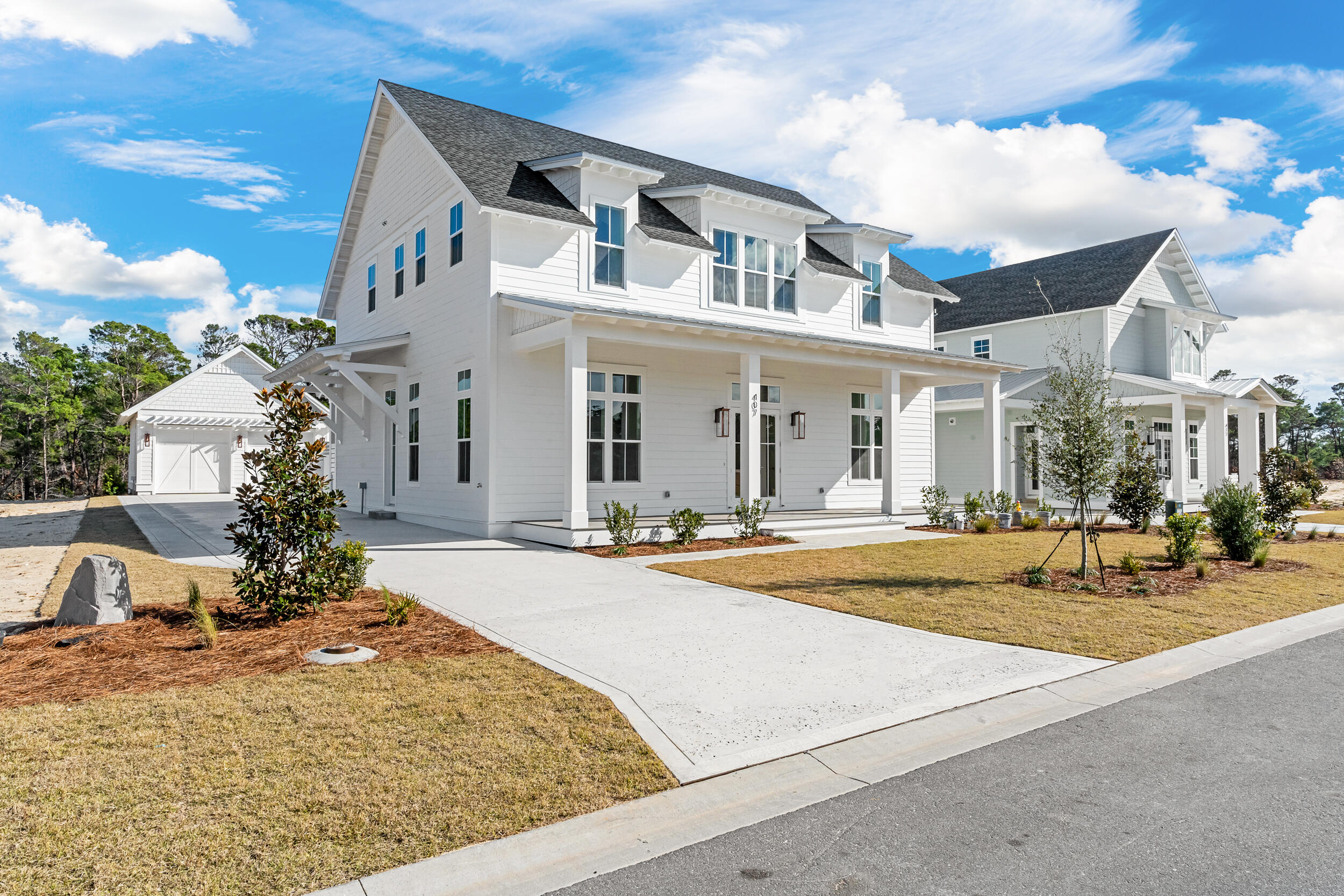 This newly completed home built by Cole Construction is the popular Rose Cottage plan, situated on a lot backing up to conservation area and has 5 bedrooms, 4.5 bathrooms, a detached 2-car garage and complete with an ultra sized pool+spa outdoor living package! MUST SEE!The moment you step inside, you'll be greeted with the grandeur of this stunning open-concept design by the spacious kitchen, dining area and living room all seamlessly connected. The primary bedroom, conveniently located on the the first floor, offers a peaceful retreat with its spacious layout and en suite bathroom complete with a soaking tub, walk-in shower and dual vanities. Upstairs offers additional 5 generously sized bedrooms and a den providing ample space for a growing family or hosting guests. This exquisite property offers luxury interior features including 12 foot ceilings throughout the first floor, prefinshed engineered wood flooring throughout, 8 foot solid core doors, shiplap in all common areas, choice of select quartz and granite countertops, Monogram stainless steel appliances with gas range and hood, Legacy shaker style cabinets with soft-close dovetail drawers, custom built closets, porcelain tile on shower walls and floors, a designer light package, plus more. The outdoor features include a private saltwater pool with elevated spa to overflow into pool, outdoor summer kitchen with 40" grill and storage doors, composite decking on front porch and expanded rear porch, an outdoor shower and a gas lantern on the front porch.
The Watersound Origins community is one of South Walton's most coveted neighborhoods for its exceptional amenities, beautiful new homes, and prime location. Amenities include the Village Commons pool & fitness center, sports courts, miles of nature trails, dock access to Lake Powell, unlimited golf, and lots of green space for outdoor play. The all new Watersound Town Center brings a new level of excitement and convenience to the community with a Publix Super Market, delicious restaurants, healthcare facilities, and more right at the entrance to the neighborhood!
*Pricing for inventory homes include lot premiums and may include optional upgrades. Added options/upgrades and pricing are subject to change. Please check with the on-site community specialists for the latest information for this home.