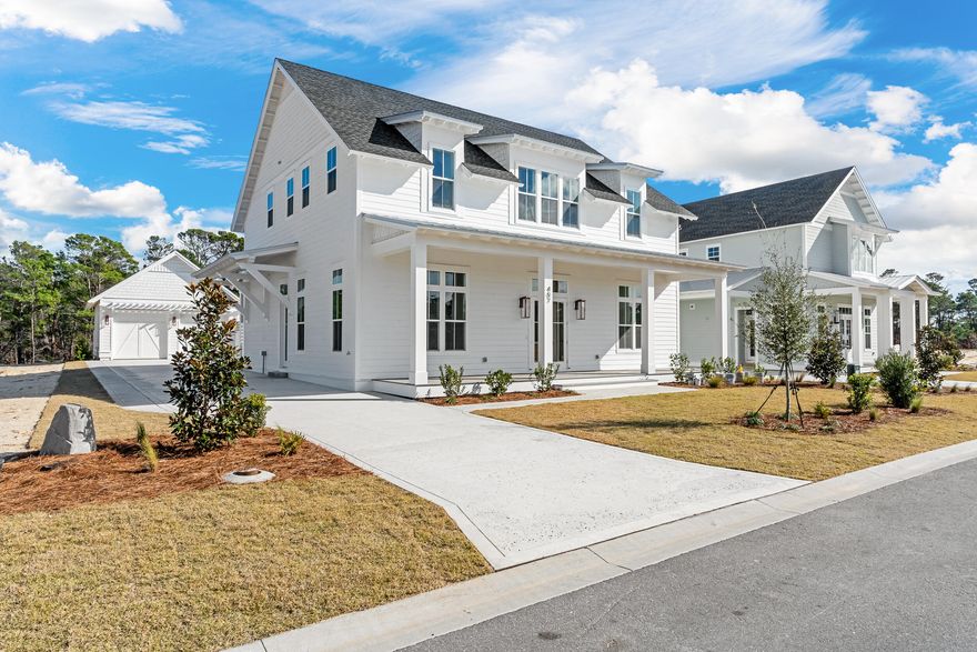 This newly completed home built by Cole Construction is the popular Rose Cottage plan, situated on a lot backing up to conservation area and has 5 bedrooms, 4.5 bathrooms, a detached 2-car garage and complete with an ultra sized pool+spa outdoor living package! MUST SEE!The moment you step inside, you'll be greeted with the grandeur of this stunning open-concept design by the spacious kitchen, dining area and living room all seamlessly connected. The primary bedroom, conveniently located on the the first floor, offers a peaceful retreat with its spacious layout and en suite bathroom complete with a soaking tub, walk-in shower and dual vanities. Upstairs offers additional 5 generously sized bedrooms and a den providing ample space for a growing family or hosting guests. This exquisite property offers luxury interior features including 12 foot ceilings throughout the first floor, prefinshed engineered wood flooring throughout, 8 foot solid core doors, shiplap in all common areas, choice of select quartz and granite countertops, Monogram stainless steel appliances with gas range and hood, Legacy shaker style cabinets with soft-close dovetail drawers, custom built closets, porcelain tile on shower walls and floors, a designer light package, plus more. The outdoor features include a private saltwater pool with elevated spa to overflow into pool, outdoor summer kitchen with 40" grill and storage doors, composite decking on front porch and expanded rear porch, an outdoor shower and a gas lantern on the front porch.

The Watersound Origins community is one of South Walton's most coveted neighborhoods for its exceptional amenities, beautiful new homes, and prime location. Amenities include the Village Commons pool & fitness center, sports courts, miles of nature trails, dock access to Lake Powell, unlimited golf, and lots of green space for outdoor play. The all new Watersound Town Center brings a new level of excitement and convenience to the community with a Publix Super Market, delicious restaurants, healthcare facilities, and more right at the entrance to the neighborhood!

*Pricing for inventory homes include lot premiums and may include optional upgrades. Added options/upgrades and pricing are subject to change. Please check with the on-site community specialists for the latest information for this home.