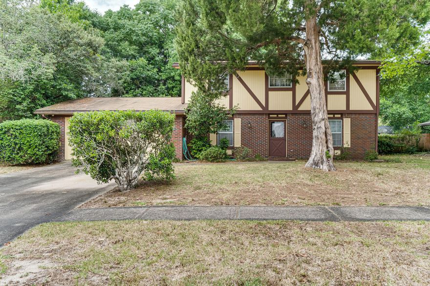 Pending under contract: Sellers accepting back up offers New Roof and Full house Rewire for the same great price.  This beautiful craftsman, brick home is located  in the much sought after Kenwood subdivision.   With a constant breeze from the surrounding bayous, you can easily imagine yourself enjoying your morning coffee or evening night cap in the relaxing ambiance created by the charming, spacious back yard complete with beautiful mature trees and perfect set up for a garden.  A 4 bedroom 2-1/2 bath house also offers a large beautifully mastered sun room with a window pass through to the kitchen providing with attached wet-bar.  Also included is masterfully crafted built ins as well.  With all this wonderful inside and outside don't forget the 2 car garage with built in workbenches,