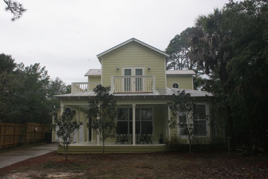 Great home walking distance to the beach with public BEACH ACCESS at South END OF STREET! NO HOMEOWNER ASSOCIATION FEES!New construction of many larger homes have been built and are currently being built on Seacrest! This 4 bedroom home has just been painted on the exterior and new decking has been installed on 2nd floor balconies! New exterior door on 2nd floor as well. New carpeting in bedrooms on the 1st floor. New Interior paint! Gas fireplace with new tile and surround. Approximately 2072 sq ft per appraisal plus approx. 511 sq ft of porches. Detached 1 car garage plus attached storage behind garage. Come enjoy nature with Point Washington State Forest at North end of street!