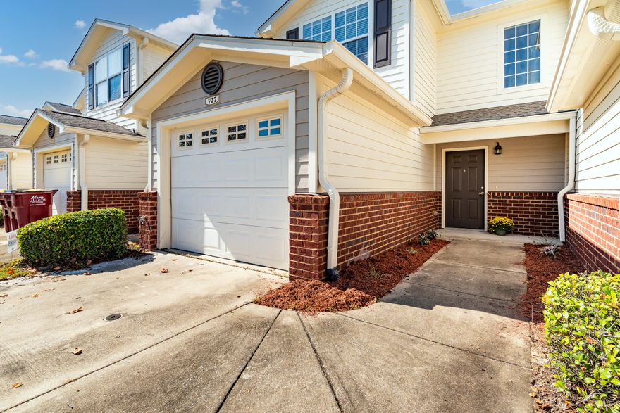 NEW ROOF, NEW FLOORS AND LOW MAINTENANCE LIVING! This townhome complex is highly sought-after because of it offers a QUICK COMMUTE TO SEVERAL BASES. AND A SPARKLING POOLl! This 2 BR/2-1/2 bath home was a long-term **HIGHLY LUCRATIVE** rental, but owner says--SELL IT! Now is your chance to cash in.Step inside to open-concept living and dining, WITH BRAND NEW LUXURY BAMBOO PLANK FLOORING and a neutral color palette.The kitchen features oak cabinetry, low-maintenance counters and white appliance suite. You also have updated lighting, fresh paint AND DESIGNATED DINING.
Upstairs, you'll find 2 SPACIOUS MASTER SUITES! That's right! TWO MASTERS AND BOTH HAVE WALK-IN CLOSETS! The ensuite bathrooms feature standard tub/shower combination and UNTAPPED EQUITY FOR THE SAVVY BUYER!
My favorite part of this property is your view! Step outside to a PRIVATE PATIO SPACE (with partition) with grilling space... and views for miles! The forest provides for "natural entertainment", and deer and songbirds are plentiful. BONUS: More time to relax because the HOA maintains your yard! #NoWork #AllPlay

This unit also includes a one-car garage, providing extra storage and convenience. 
Better hurry! This unit is PRICED TO MOVE!